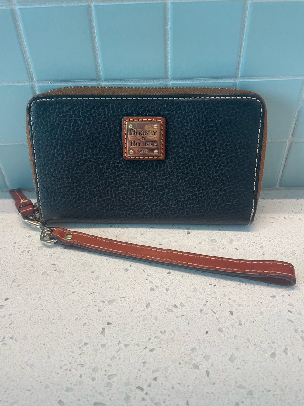 Dooney & Bourke Pebble Grain Large zip around wristlet with caramel trim